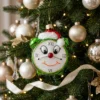 Syn_Bombkarza-zegar-z-czapka-swietego-mikolaja-zielony-SNBK0175_square_2048_4