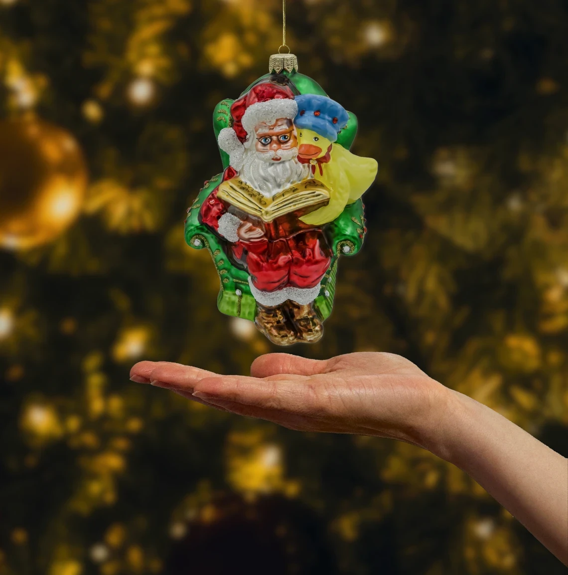 Bombka szklana figurka Mikołaj czytający książkę z kaczuszką realne zdjęcie